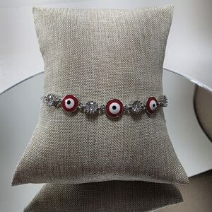 Elegant Evil Eye Bolo Bracelet with Red and Silver Accents